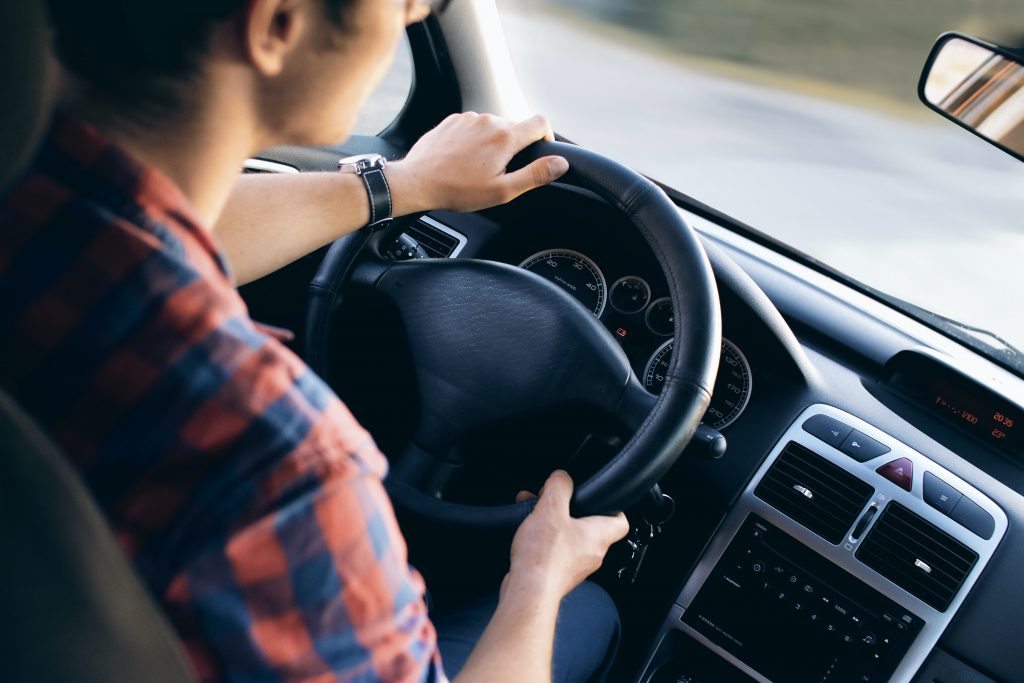 stock photo of a student driving a car